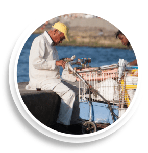 old man with shopping cart of belongings